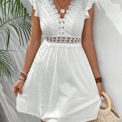 Robe en tricot jacquard avec découpe, élastique, transparente, en dentelle et manches papillon